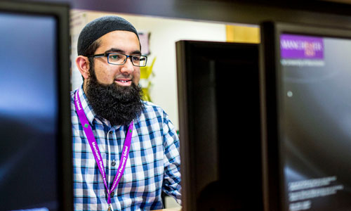 Man sitting at a computer