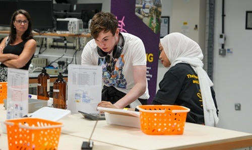 2 people at a desk