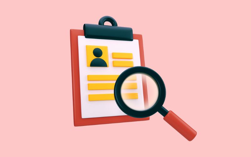 Graphic of a clipboard and a magnifying glass