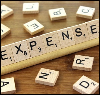 Image of the word expenses, displayed using Scrabble letter pieces