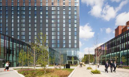 Image of AMBS square with the AMBS building and the Hyatt Hotel