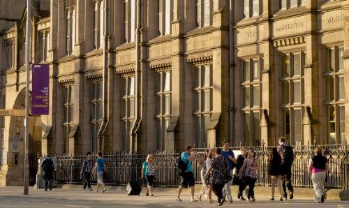 Image of John Owens from Oxford road view with pedestrians walking