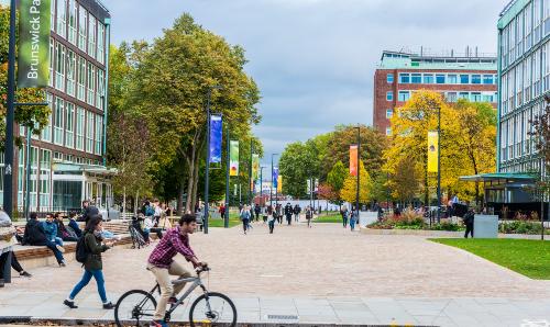 Cyclist and pedestrians in Brunswick Park