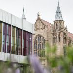 Image of campus learning commons and main building