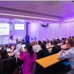 image of attendees in lecture hall