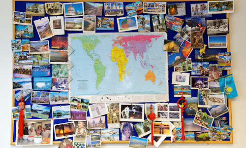 World map and postcards