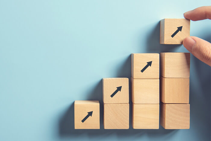 Blocks placed on top of one another showing success