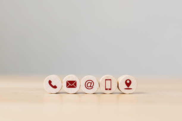 Icons relating to a telephone, email, @, mobile phone and location pin.