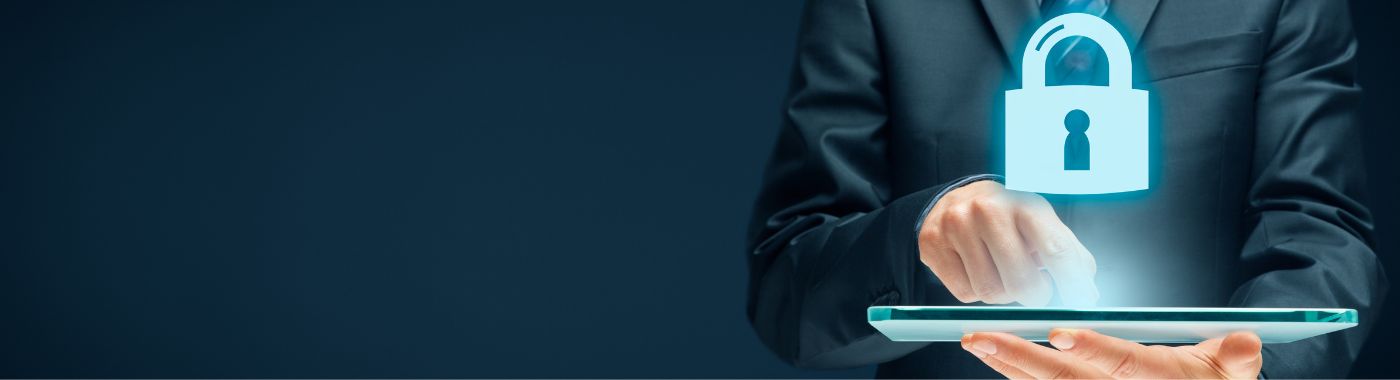 A businessman holding a tablet symbolising security and information technology.