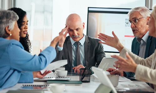 A group of business people having an intense conversation.