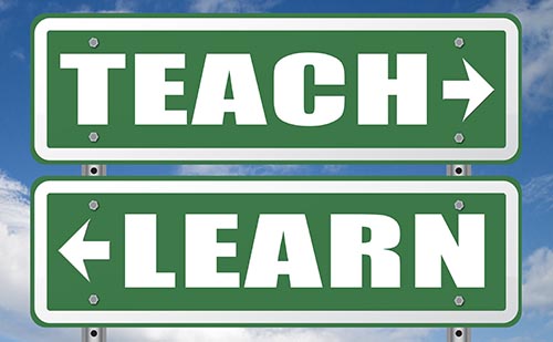 Teach and Learn sign