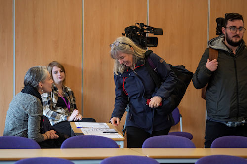 People signing in to event