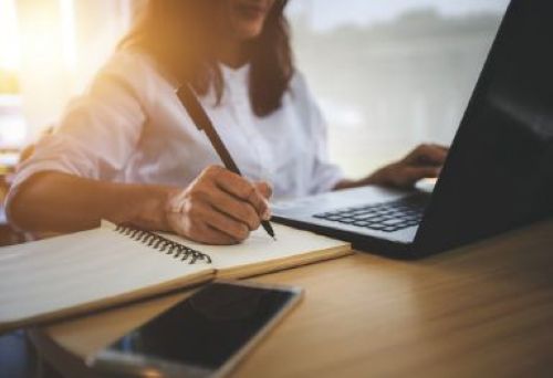 writing notes from laptop image