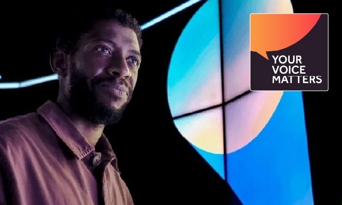 Man looking into the distance with graphic behind him